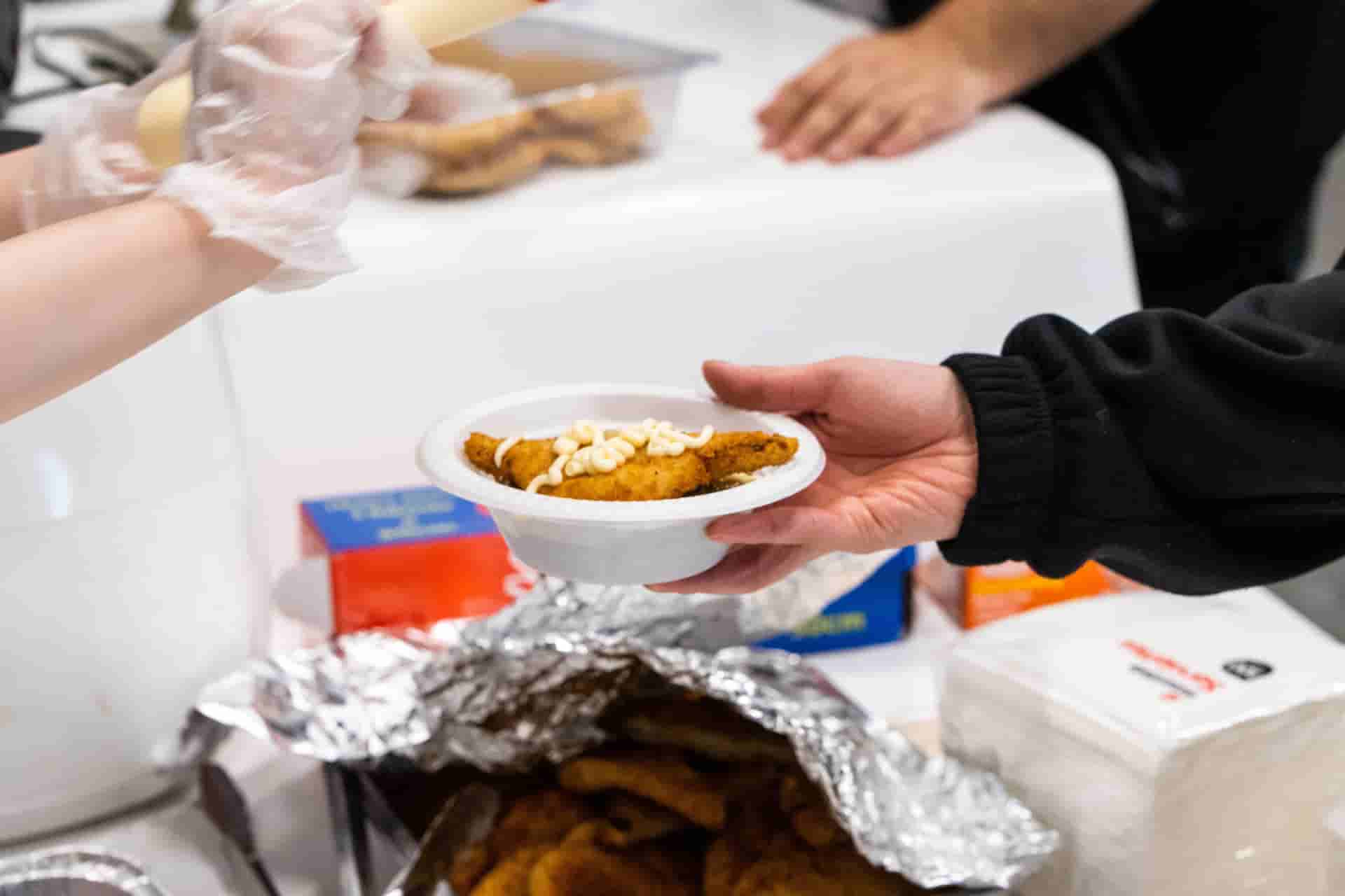 Free food being handed out to members at our Food Care Package event